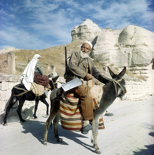 Turkey, Cappadocia, farmer and peasant woman on donkeys